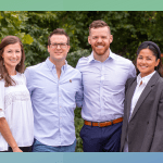 both doctors and 2 women smiling
